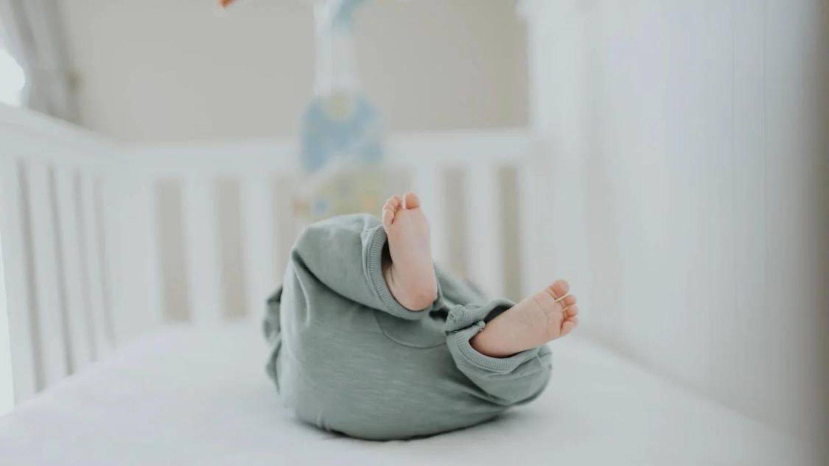 Why do newborns roll to the side while sleeping? Annie Baby Monitor