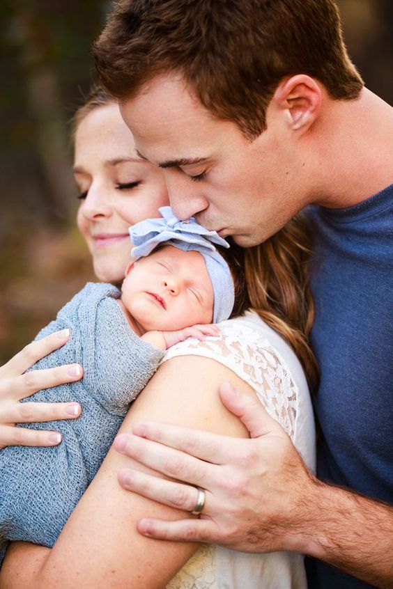 Happy Young Couple Posing With Baby Daughter Stock Photo - Download Image  Now - Adult, Affectionate, Autumn - iStock